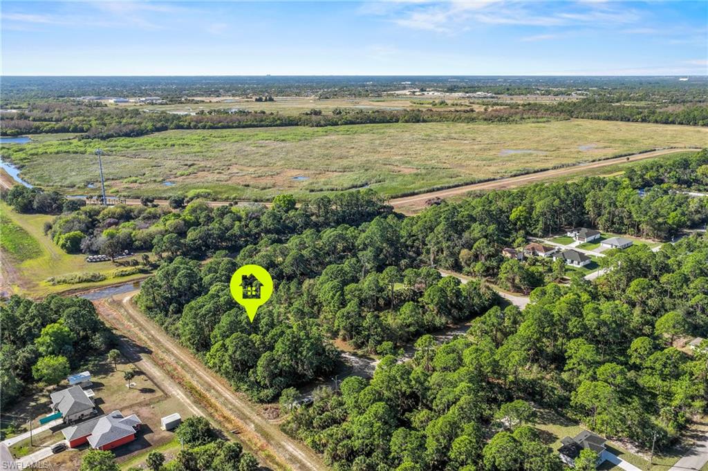 4702 Rita Avenue North Lehigh Acres, FL 33971 - Photo 13 of 15 a view of a city and an ocean view
