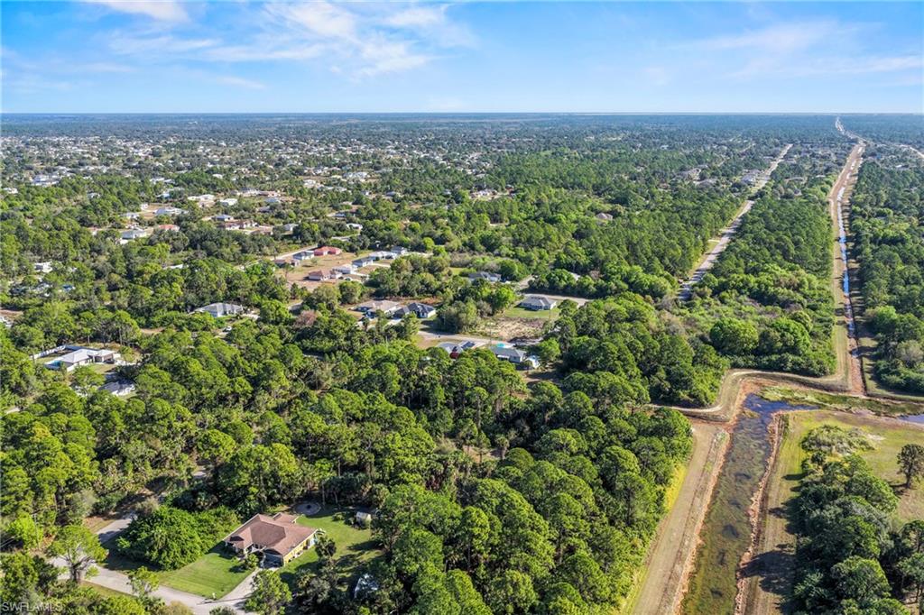 4702 Rita Avenue North Lehigh Acres, FL 33971 - Photo 8 of 15 an aerial view of multiple house