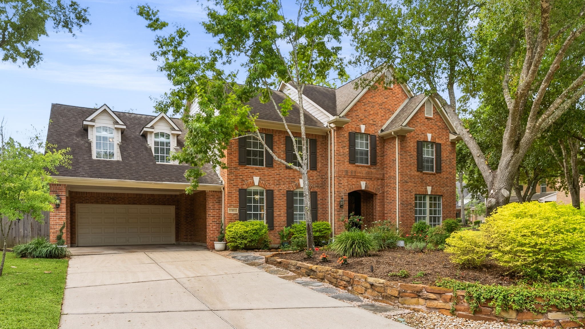 11 Mirror Ridge Court The Woodlands, TX 77382 - Photo 3 of 50 Nestled on a large cul-de-sac corner lot in the sought-after Hazelcrest neighborhood.