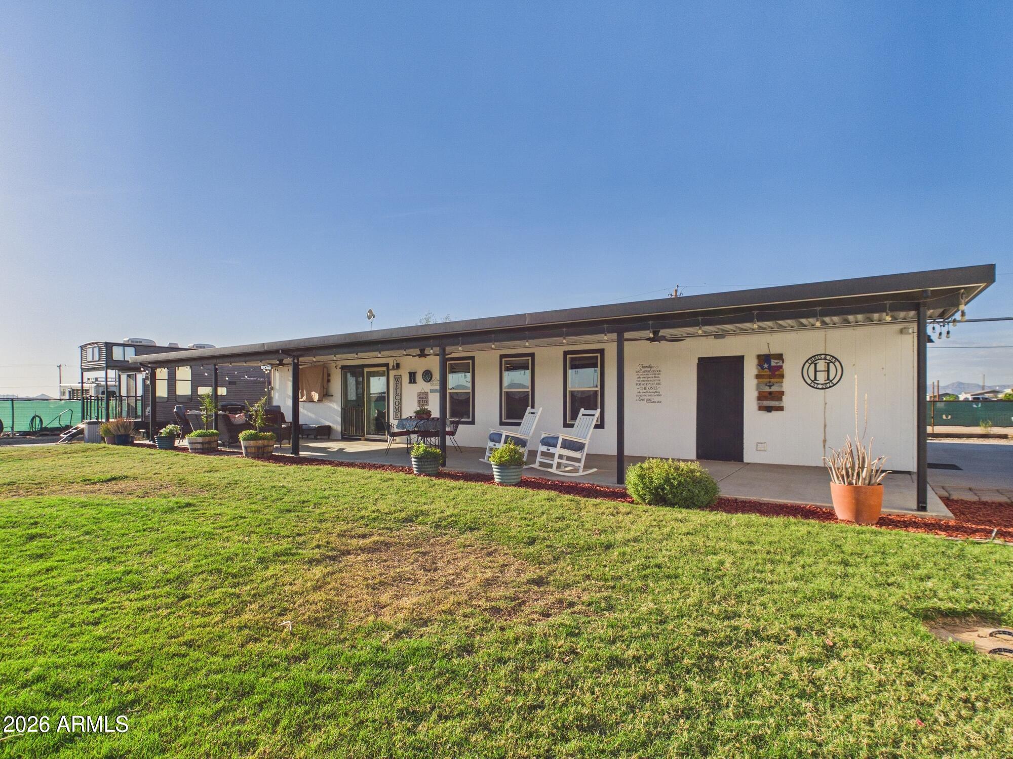 11983 East Tennyson Road Florence, AZ 85132 - Photo 3 of 35 CAM03379G0-PR0194-STILL024