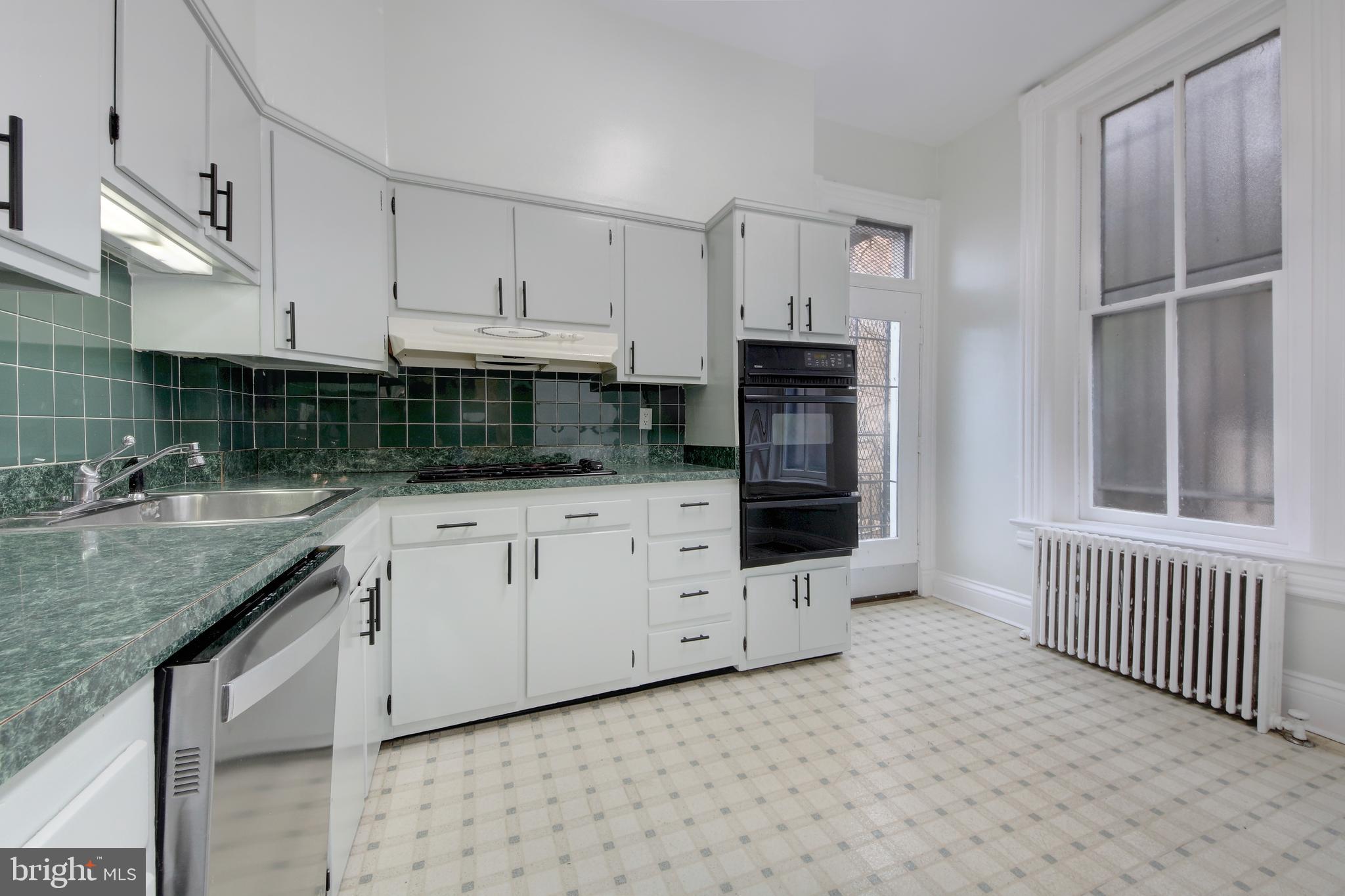 2007 Kalorama Road Northwest, Unit 1 Washington, DC 20009 - Photo 8 of 22 Large kitchen. Lots of cabinets for storage