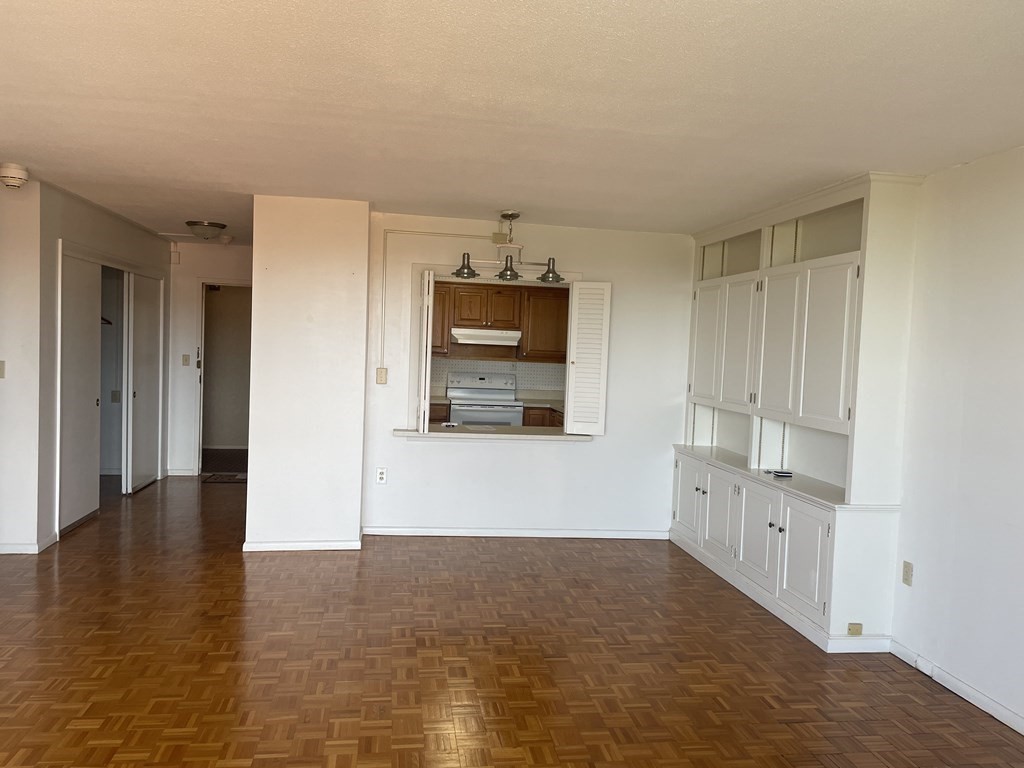 80 Salisbury Street, Unit 806 Worcester, MA 01609 - Photo 4 of 13 a view of empty room with wooden floor