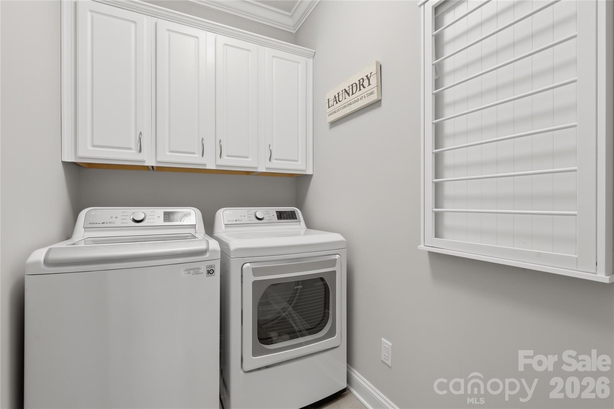 3023 Eagle Ridge Lane Indian Trail, NC 28079 - Photo 44 of 47 a utility room with dryer and washer