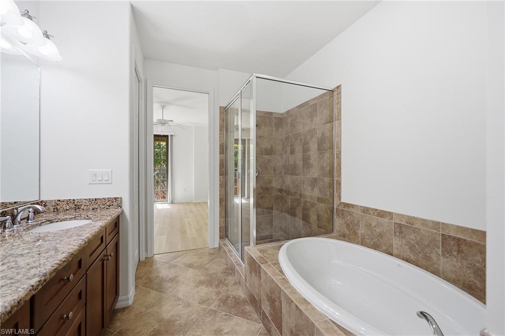 9037 Alturas Street, Unit 372 Naples, FL 34113 - Photo 17 of 35 Primary Bathroom