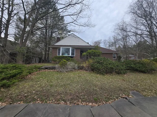 front view of house with a yard