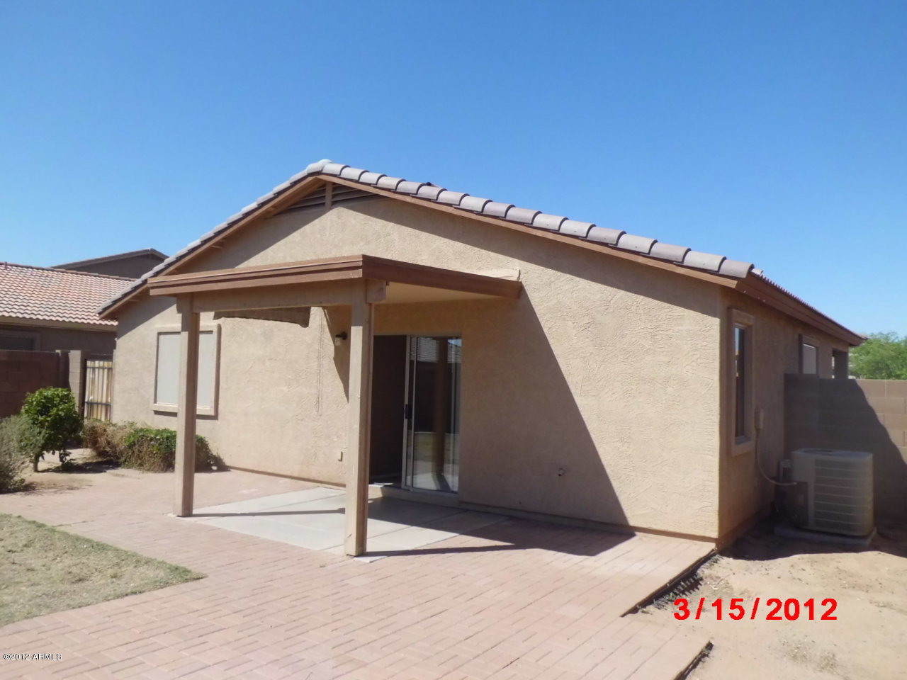 16157 West Hearn Road Surprise, AZ 85379 - Photo 15 of 15 backyard facing house