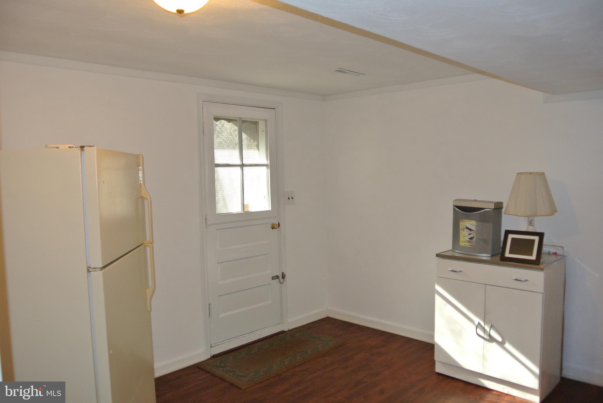 511 Gladhill Road Odenton, MD 21113 - Photo 31 of 38 Bonus room with walk up stairs to back yard