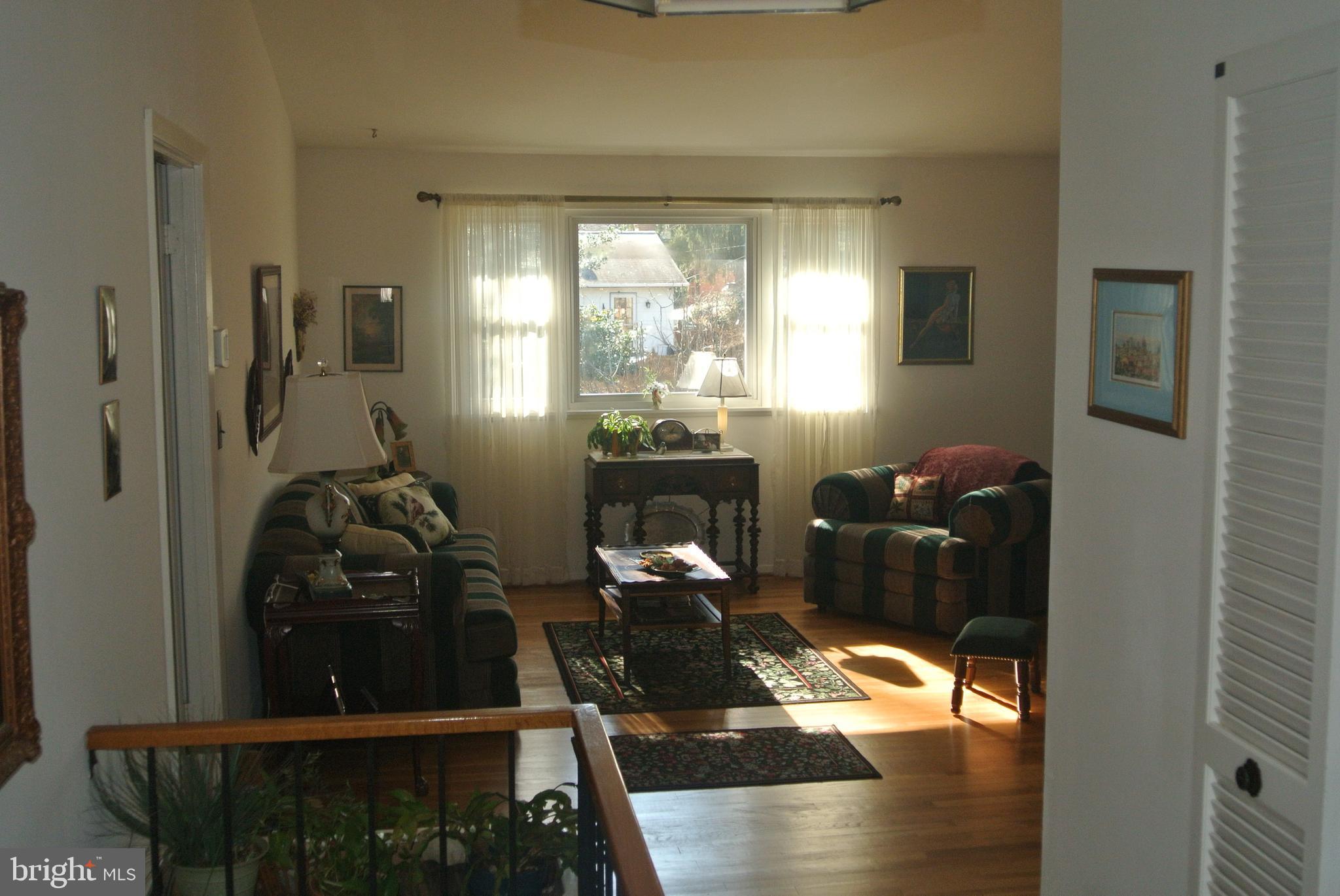 511 Gladhill Road Odenton, MD 21113 - Photo 6 of 38 Sight line from main entry through to back window.