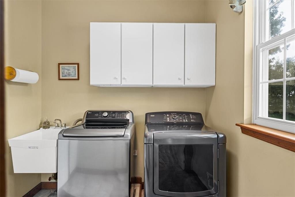 204 Salt Works Road Harmony, PA 16037 - Photo 15 of 35 a utility room with dryer and washer