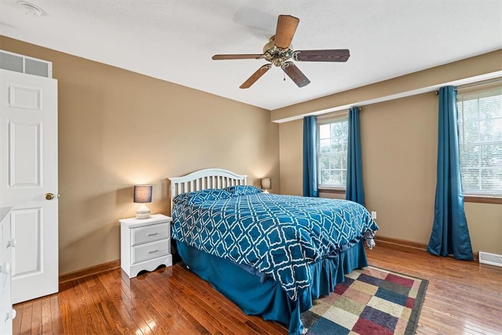 204 Salt Works Road Harmony, PA 16037 - Photo 21 of 35 a bedroom with a bed and a window