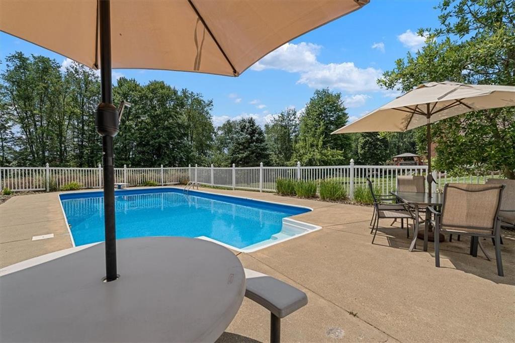 204 Salt Works Road Harmony, PA 16037 - Photo 30 of 35 a view of a chairs and table in the patio