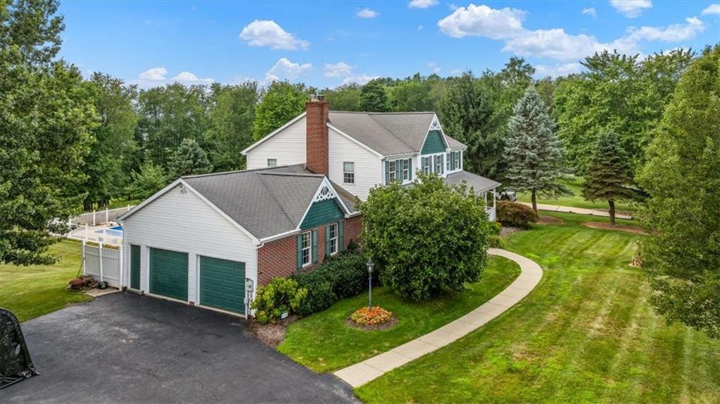 204 Salt Works Road Harmony, PA 16037 - Photo 3 of 35 a aerial view of a house next to a yard