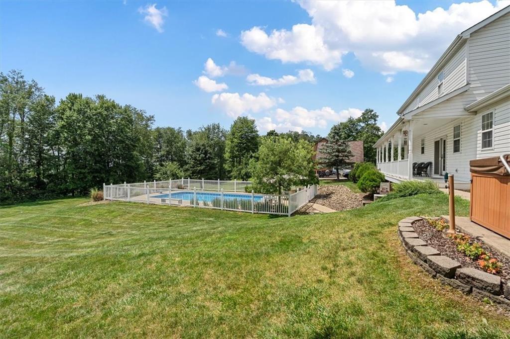204 Salt Works Road Harmony, PA 16037 - Photo 33 of 35 a view of a backyard with sitting area