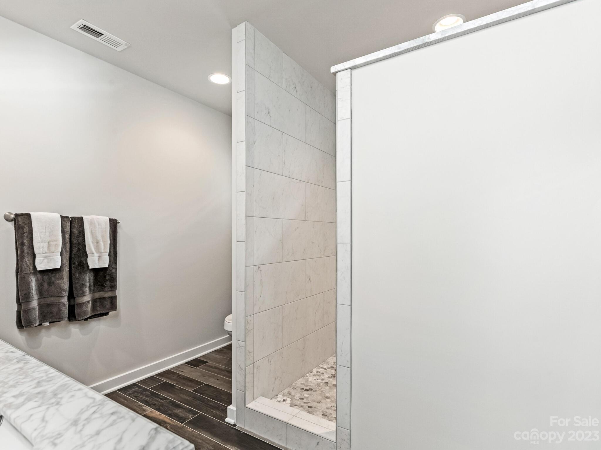 4601 Murrayhill Road Charlotte, NC 28209 - Photo 13 of 21 a bathroom with a shower
