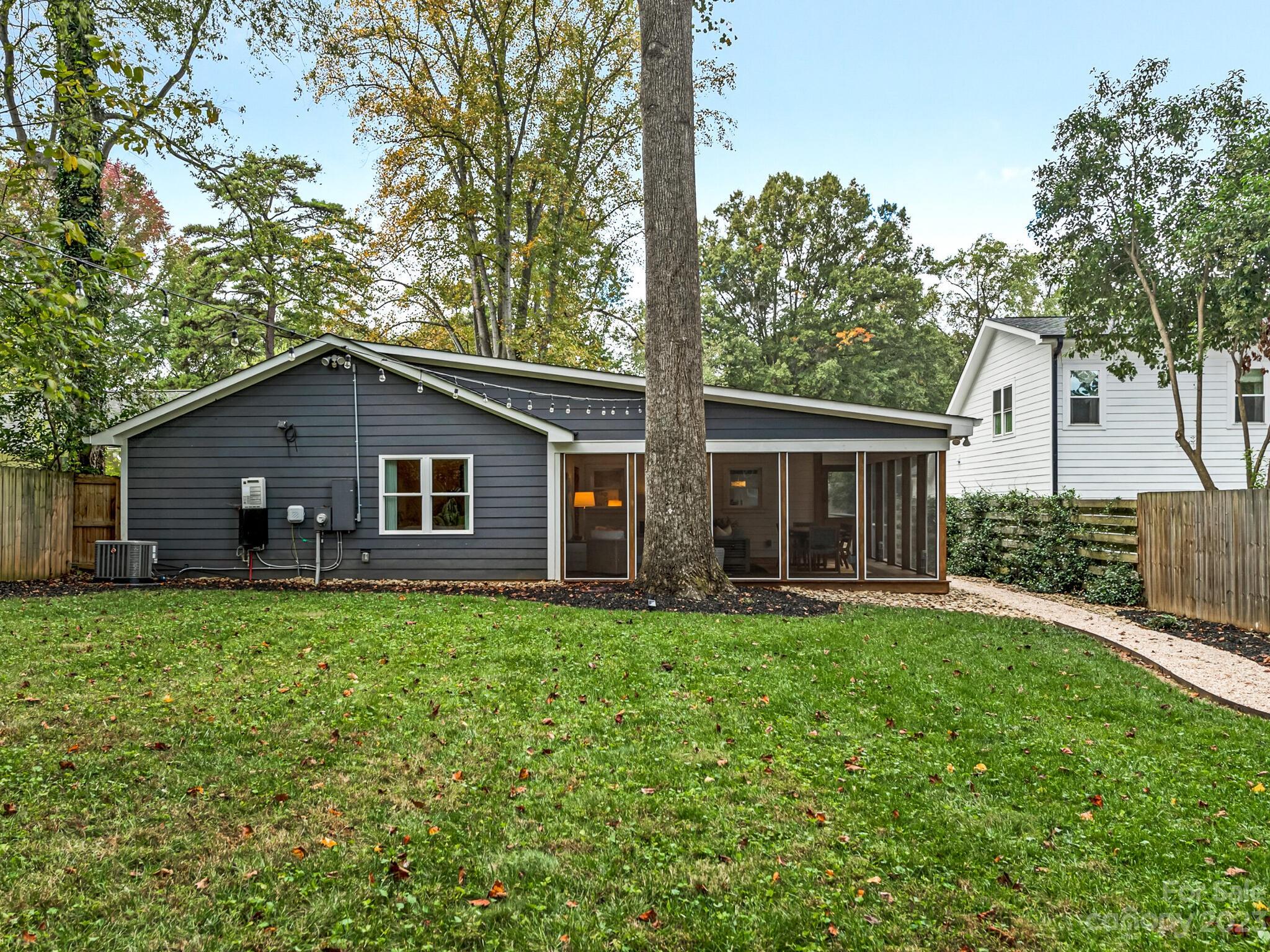 4601 Murrayhill Road Charlotte, NC 28209 - Photo 21 of 21 a view of a house with a yard