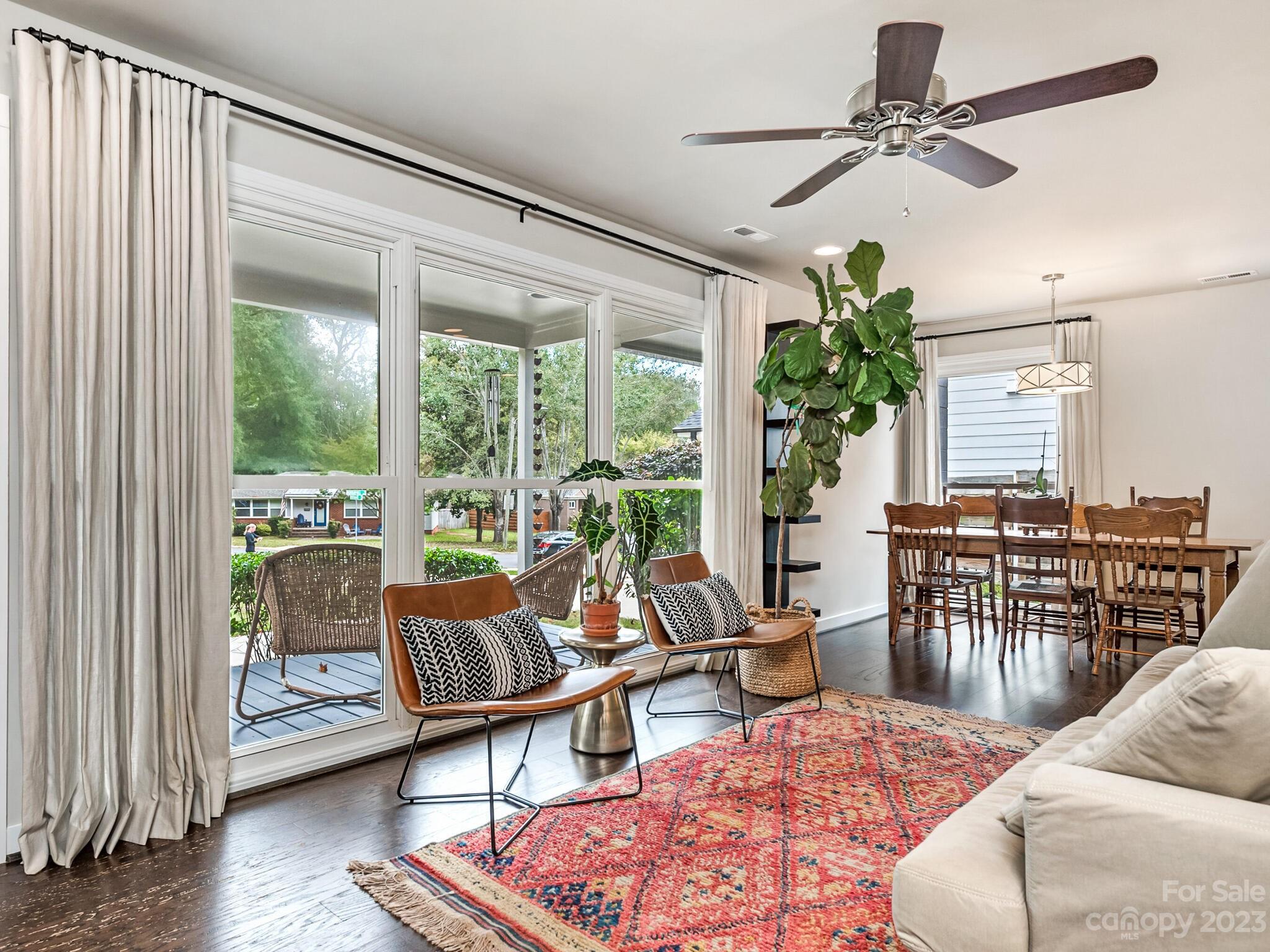 4601 Murrayhill Road Charlotte, NC 28209 - Photo 3 of 21 a living room with furniture and a large window