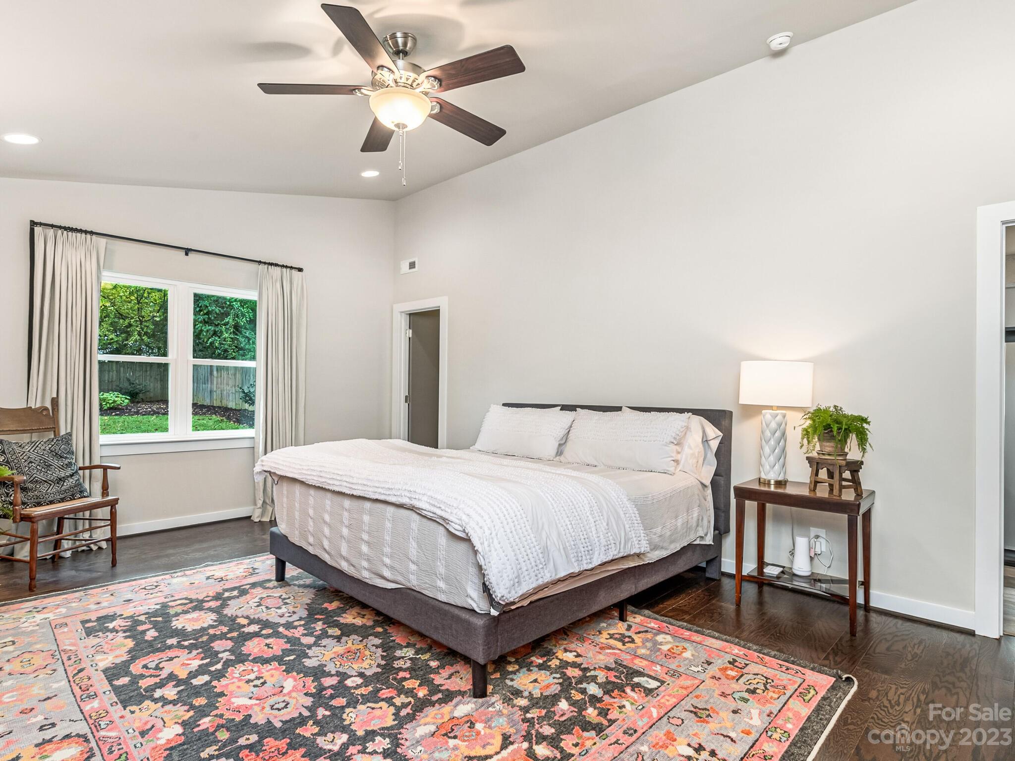 4601 Murrayhill Road Charlotte, NC 28209 - Photo 10 of 21 a bedroom with a bed table and two window