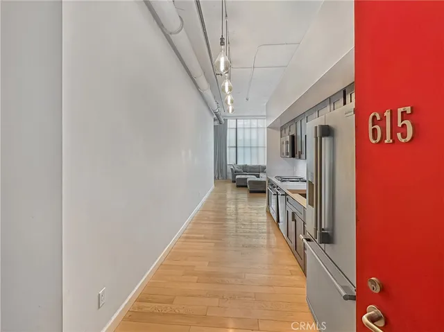 a view of a living room with a hallway