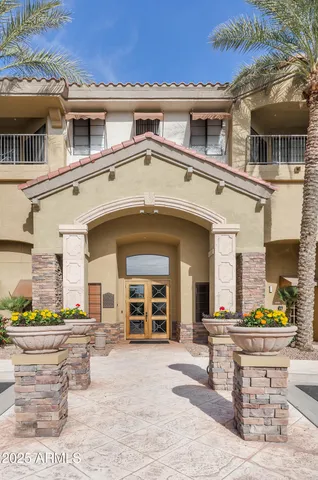 a view of a building with a street