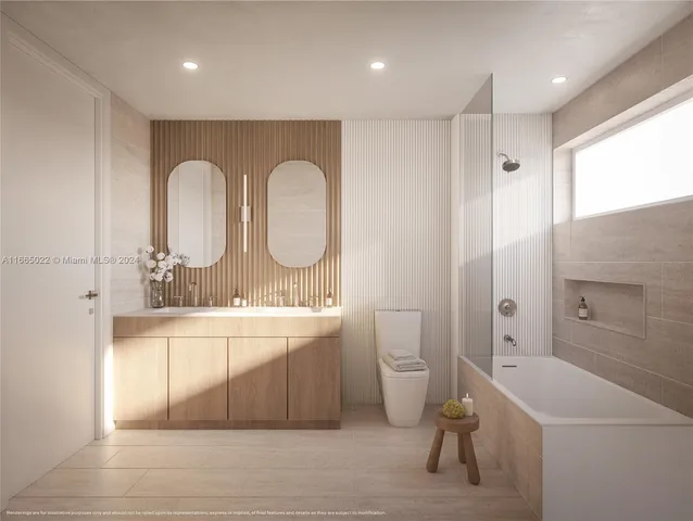 a large bathroom with a double vanity sink a mirror and a shower