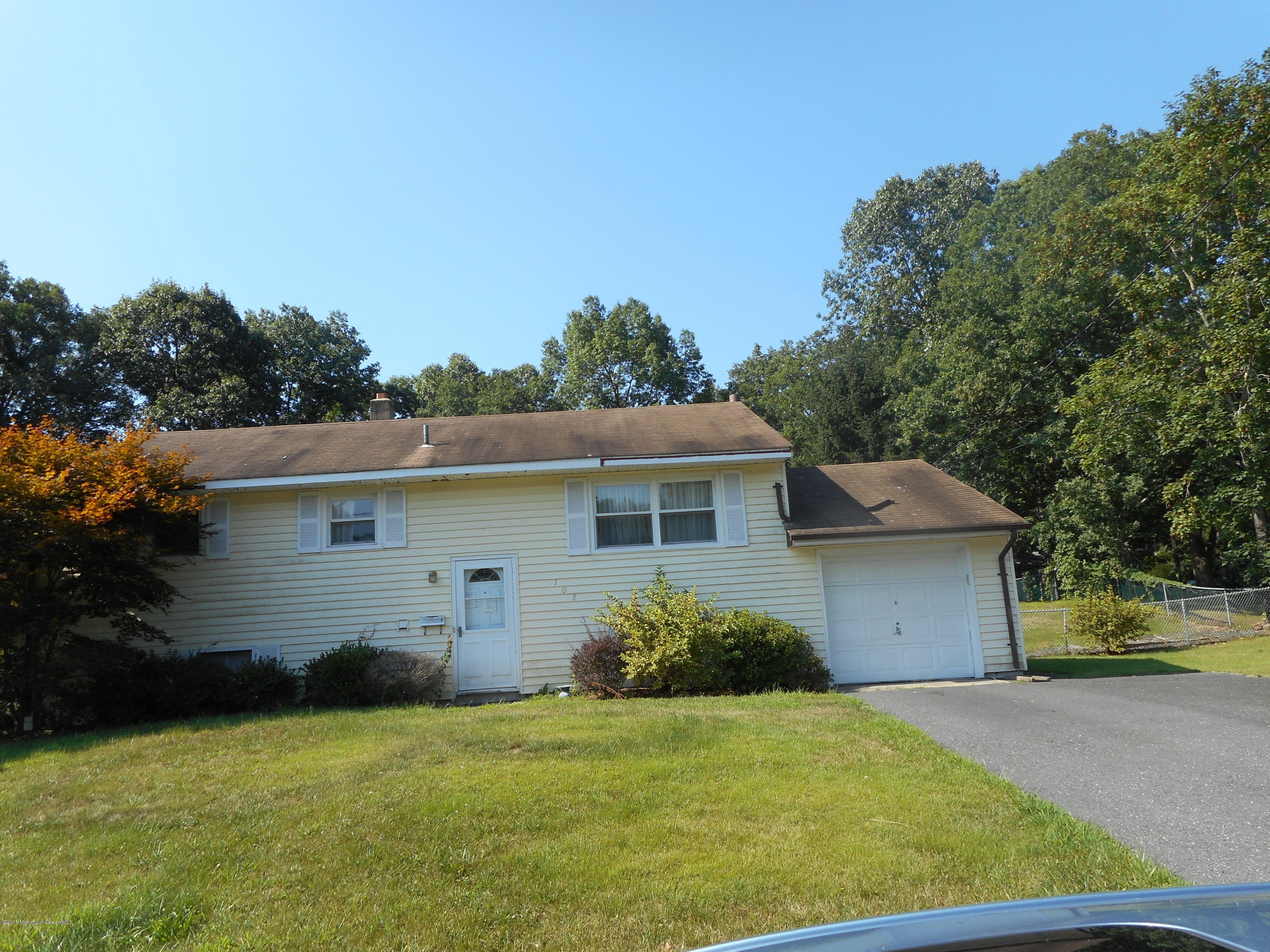 108 Darien Road Howell, NJ 07731 - Photo 11 of 22 front view of a house with a yard