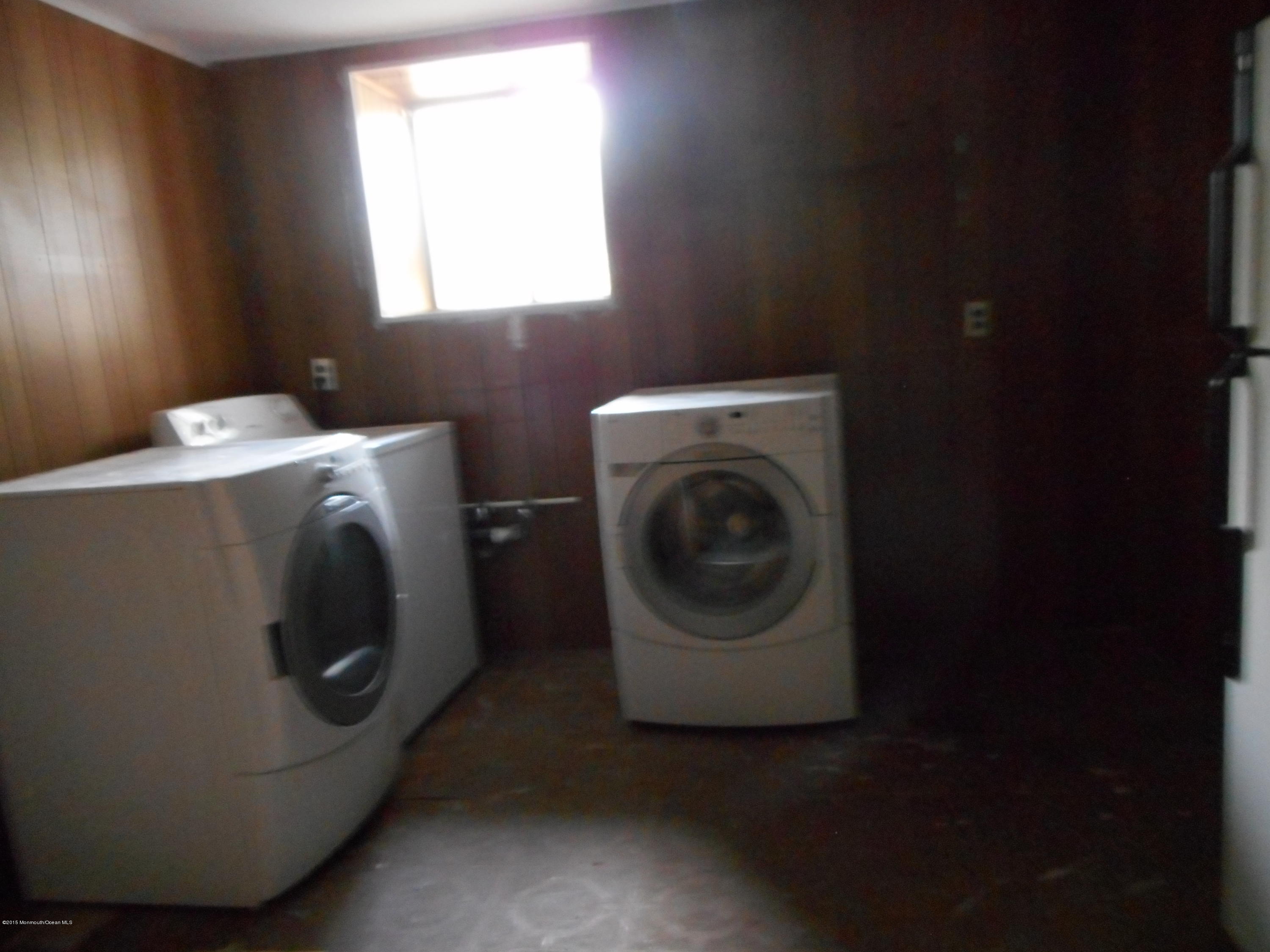 108 Darien Road Howell, NJ 07731 - Photo 15 of 22 a utility room with dryer and washer