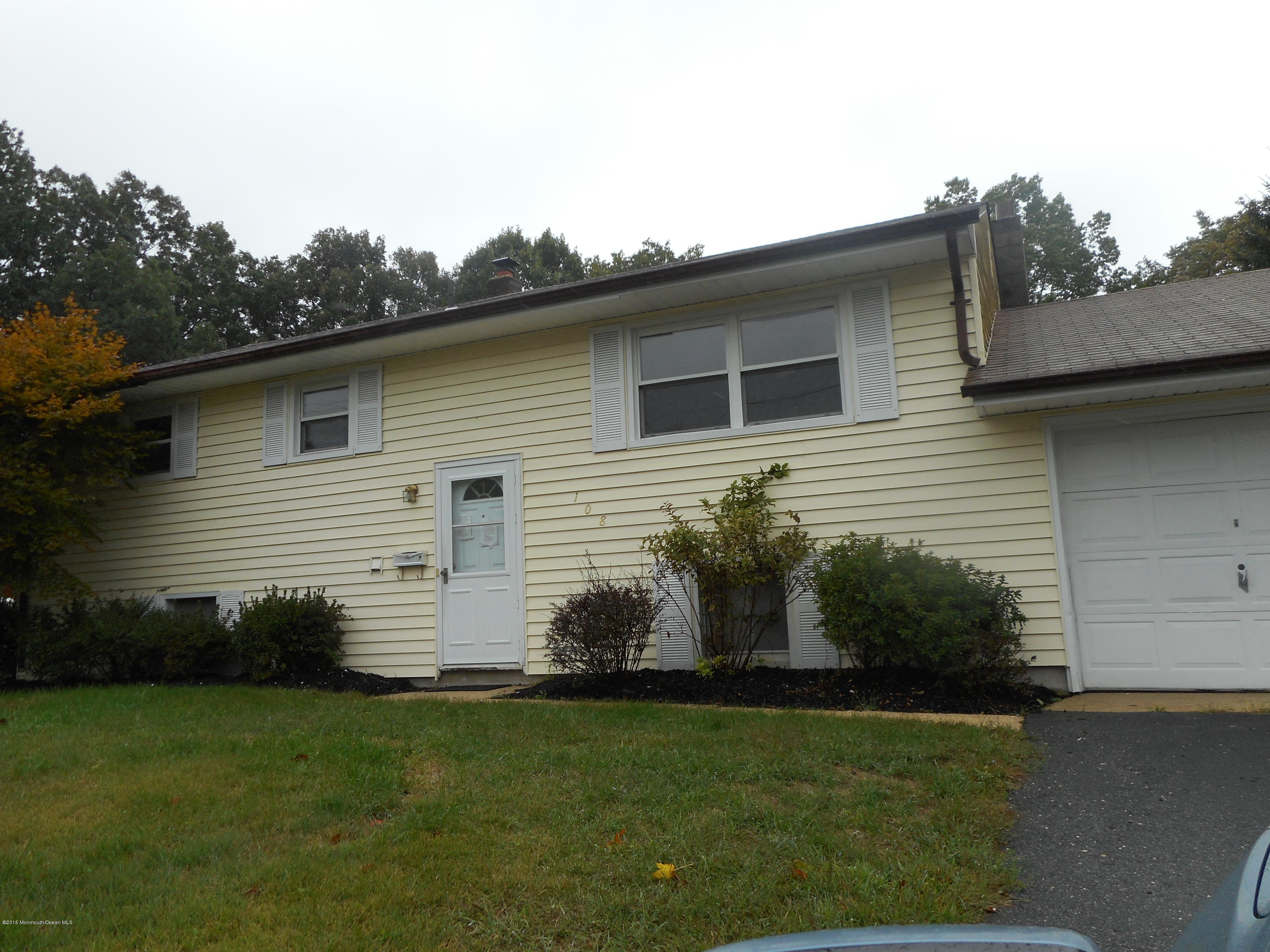 108 Darien Road Howell, NJ 07731 - Photo 21 of 22 a front view of a house with garden