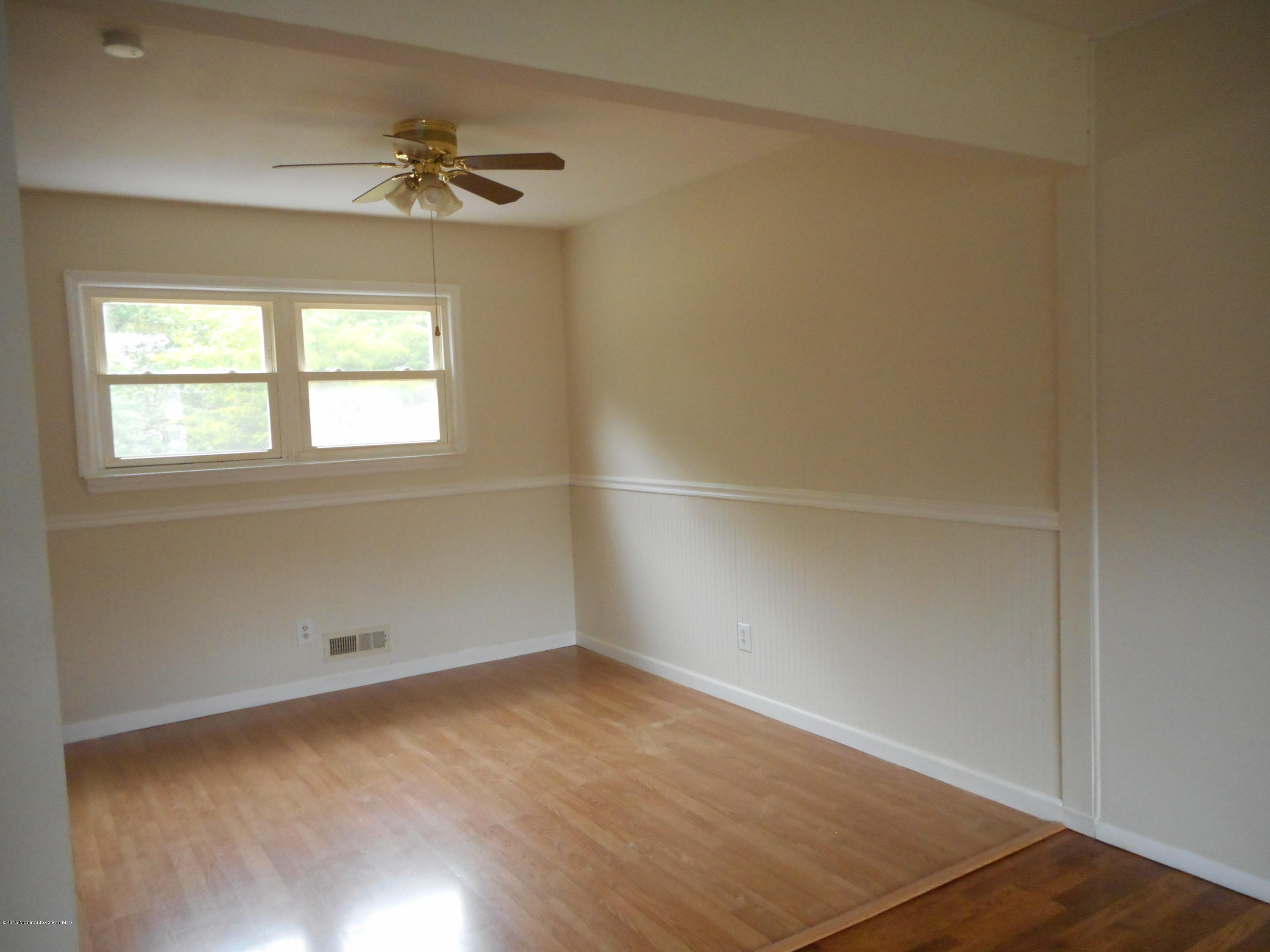 108 Darien Road Howell, NJ 07731 - Photo 10 of 22 an empty room with a window