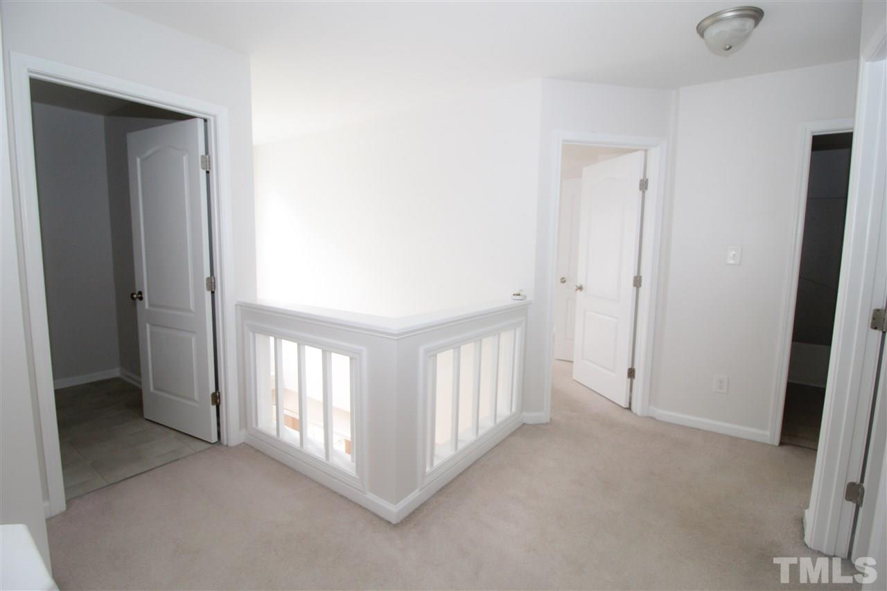 3313 Sunbright Lane Raleigh, NC 27610 - Photo 10 of 25 a view of a hallway
