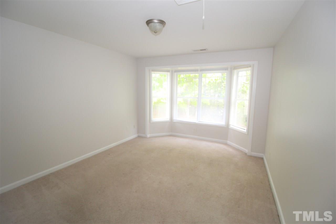 3313 Sunbright Lane Raleigh, NC 27610 - Photo 19 of 25 a view of an empty room with a window