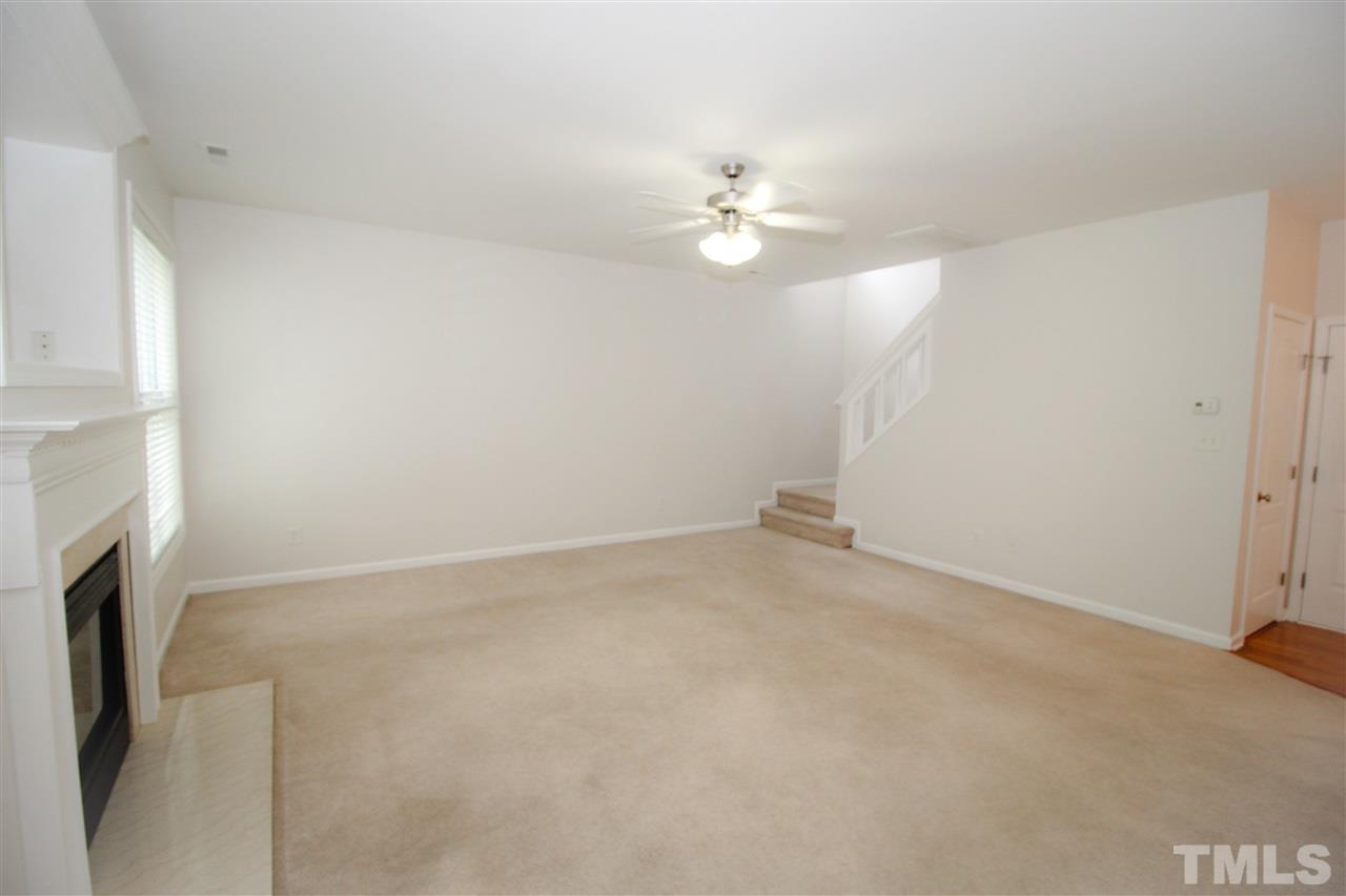 3313 Sunbright Lane Raleigh, NC 27610 - Photo 4 of 25 a view of empty room with fan