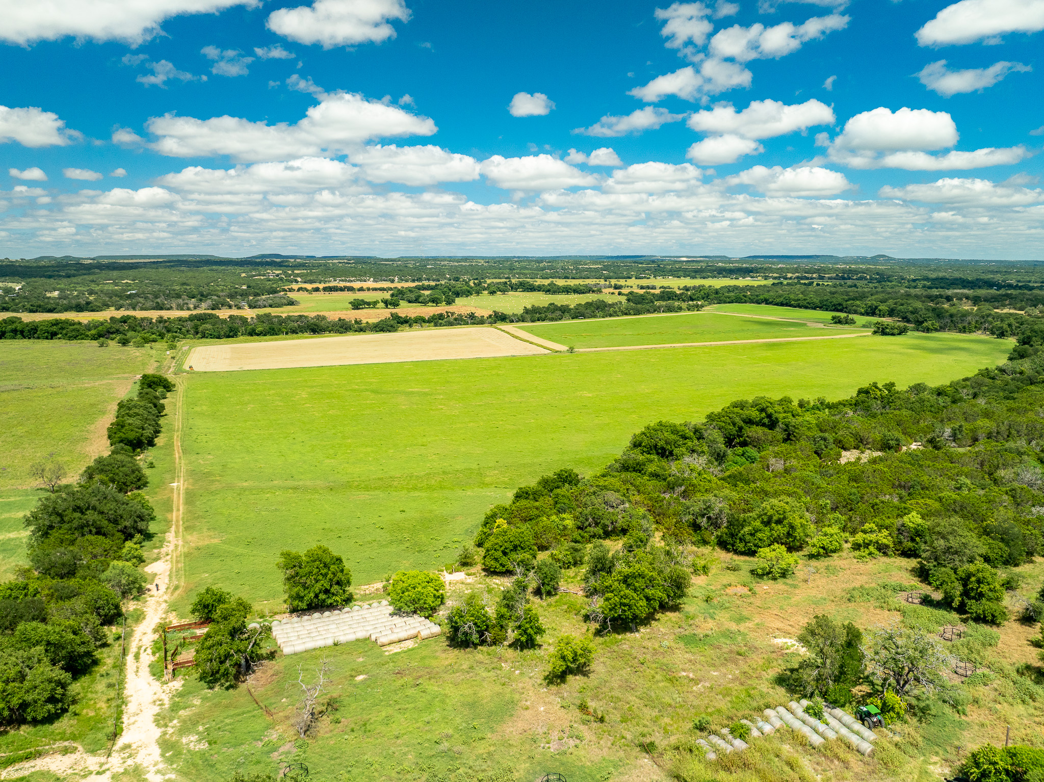 8044 580th Street East Kempner, TX 76539 - Photo 12 of 40 Vast green fields and abundant natural foliage create an idyllic rural landscape.