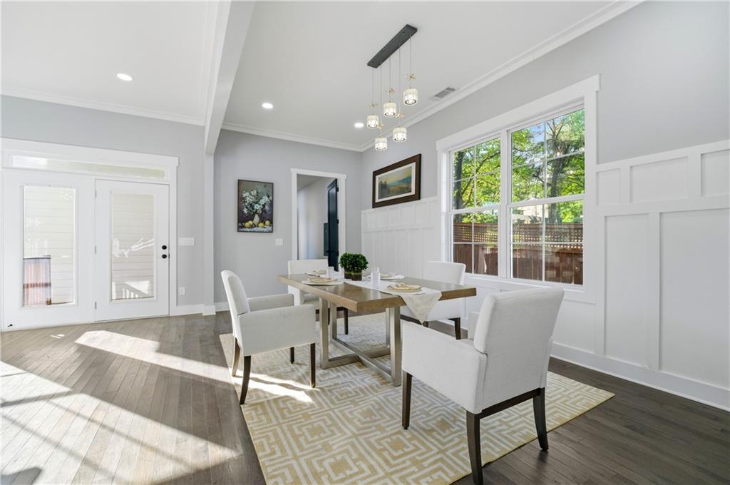 358 St Johns Avenue Southwest Atlanta, GA 30315 - Photo 13 of 35 a living room with furniture and a large window