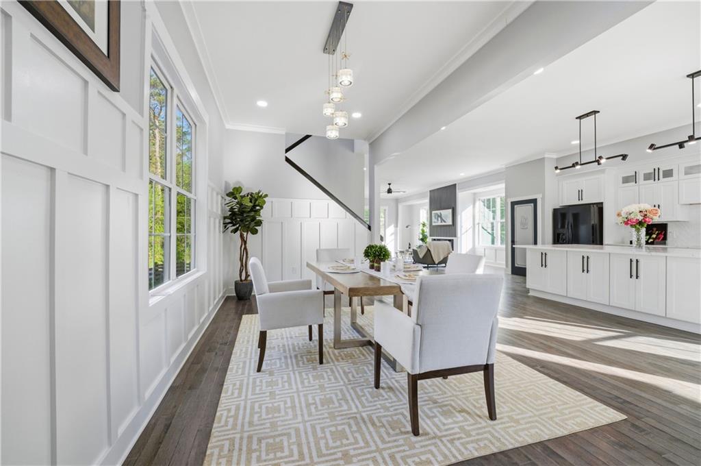 358 St Johns Avenue Southwest Atlanta, GA 30315 - Photo 14 of 35 a dining room with furniture and wooden floor