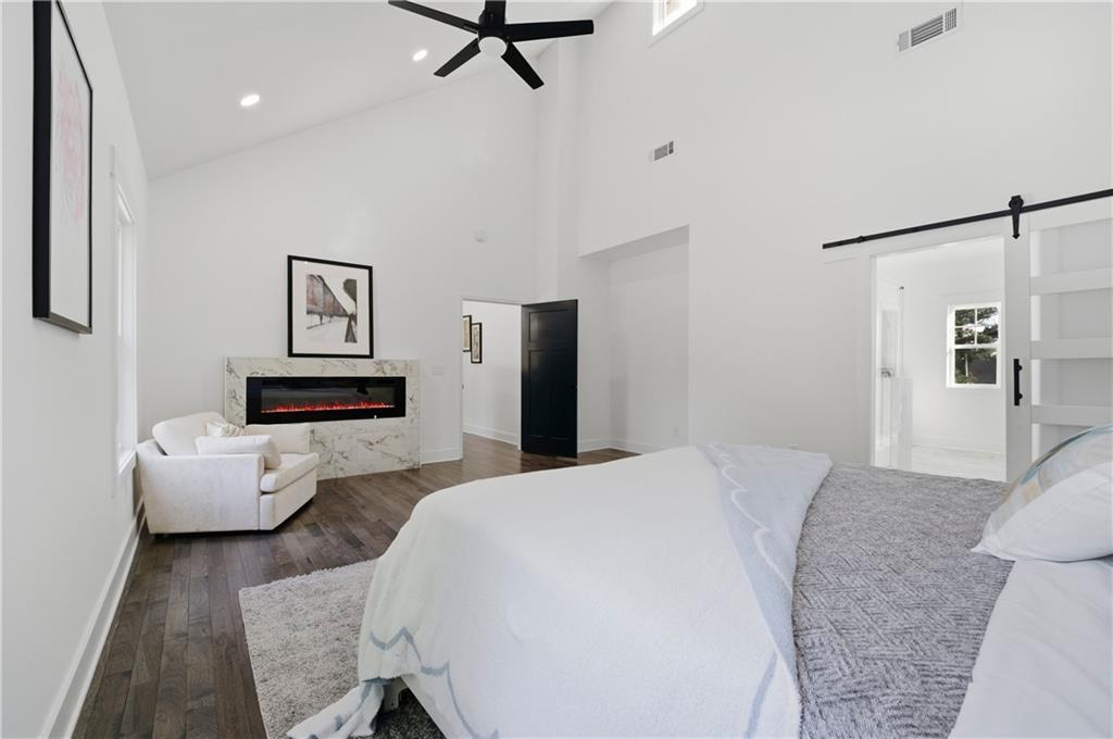 358 St Johns Avenue Southwest Atlanta, GA 30315 - Photo 26 of 35 a spacious bedroom with a bed and furniture