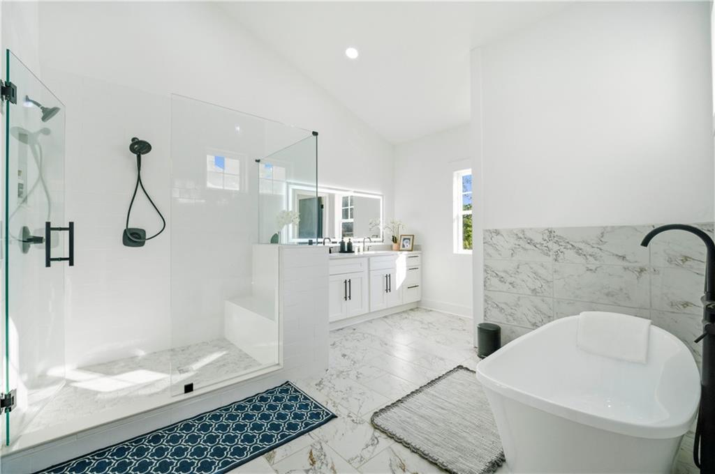358 St Johns Avenue Southwest Atlanta, GA 30315 - Photo 27 of 35 a bathroom with a sink a toilet and shower