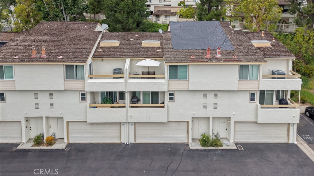 259 Scenic Way Brea, CA 92821 - Photo 48 of 62 an aerial view of a house with a garden and parking