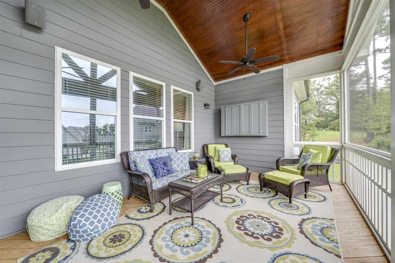 7504 Pinaster Place Raleigh, NC 27613 - Photo 11 of 30 Pre-wire for a TV & surround sound, high cathedral ceiling w/ beadboard ceiling! Screened porch