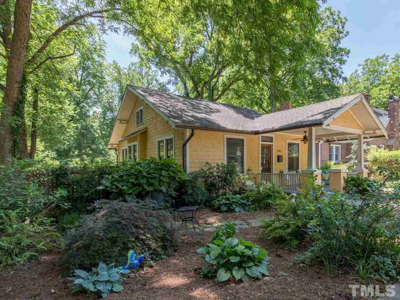 517 Washington Street Raleigh, NC 27605 - Photo 2 of 30 a front view of a house with a yard