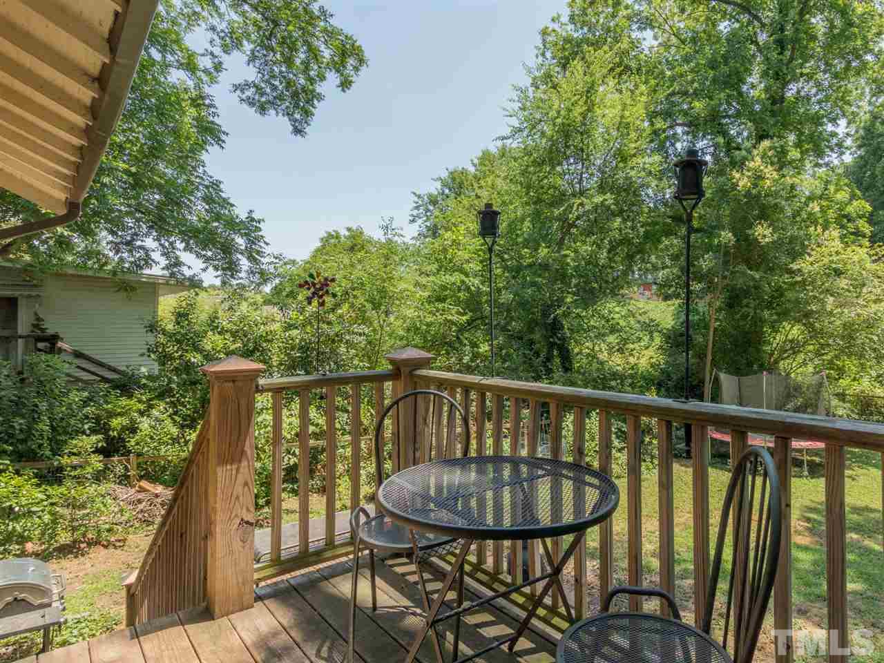 517 Washington Street Raleigh, NC 27605 - Photo 27 of 30 a view of a balcony with chairs
