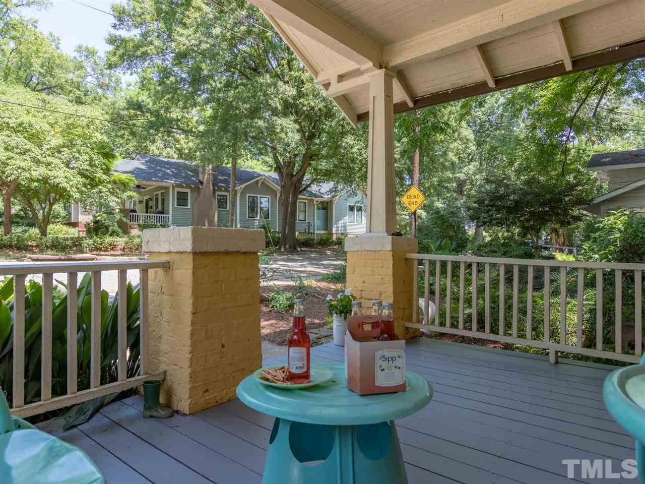 517 Washington Street Raleigh, NC 27605 - Photo 5 of 30 a view of a deck with furniture and a backyard