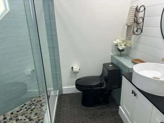 a bathroom with a sink and toilet