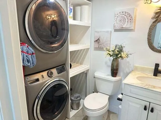 a bathroom with a toilet and a sink