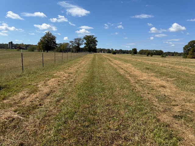 555 Smith Road Crossville, TN 38571 - Photo 27 of 33 a view of a lake with sunset in background