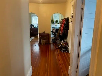 a view of a entryway with wooden floor