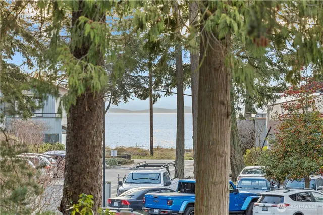 a white building with a white fence