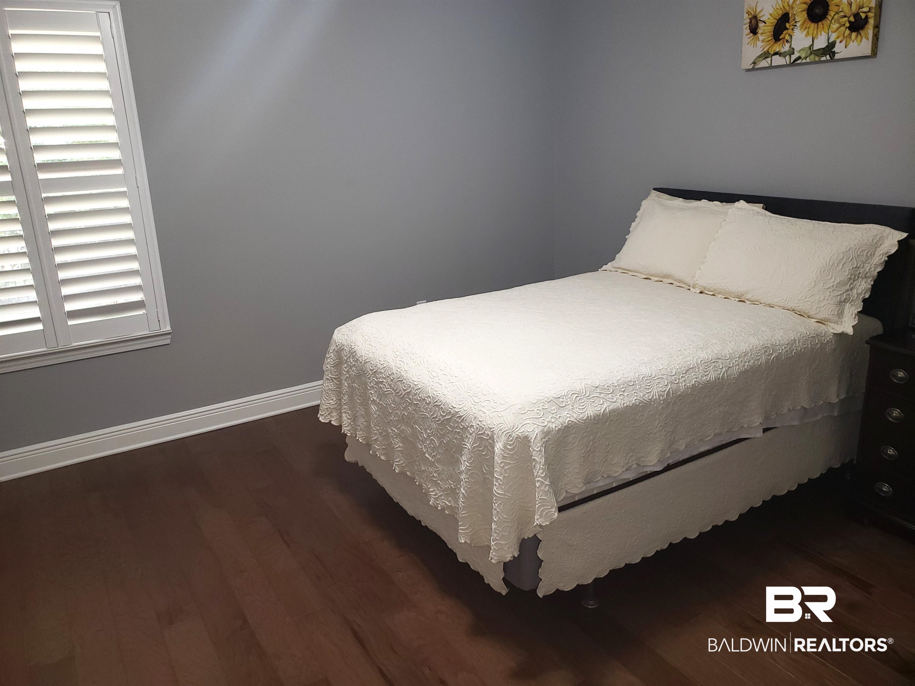 23373 Dundee Circle Foley, AL 36535 - Photo 17 of 34 Bedroom featuring wood flooring