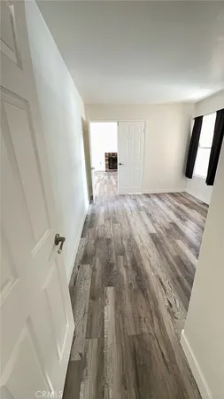 a bathroom with a double vanity sink and mirror