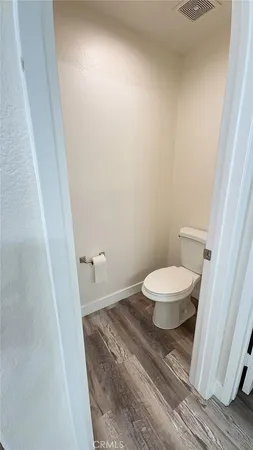 a spacious bathroom with a double vanity sink and a mirror