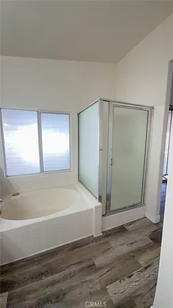 wooden floor in a en suite bathroom